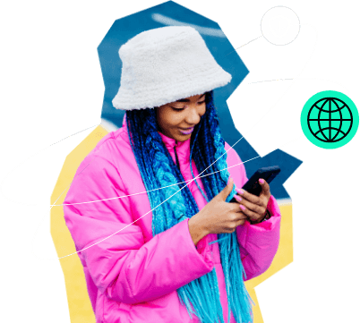 Young stylish woman looking at smartphone and smiling